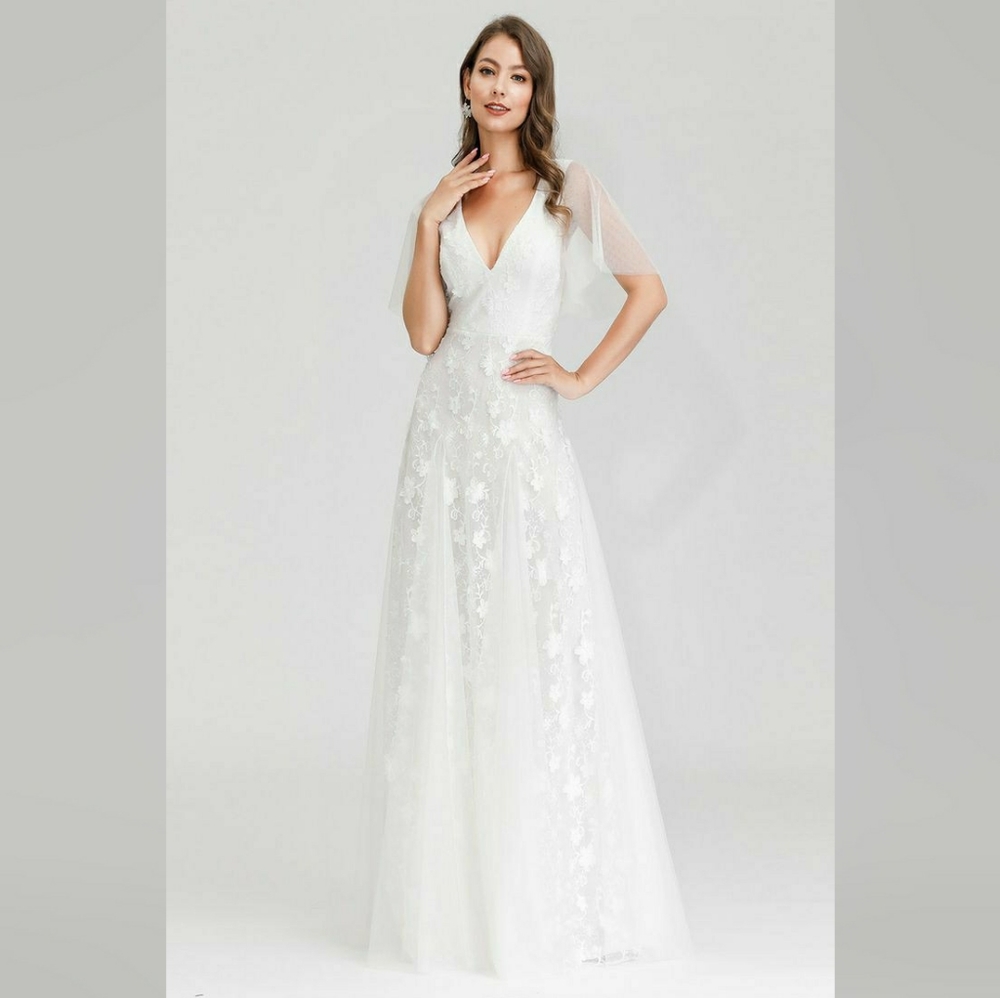 White wedding or prom dress with flutter sleeve.